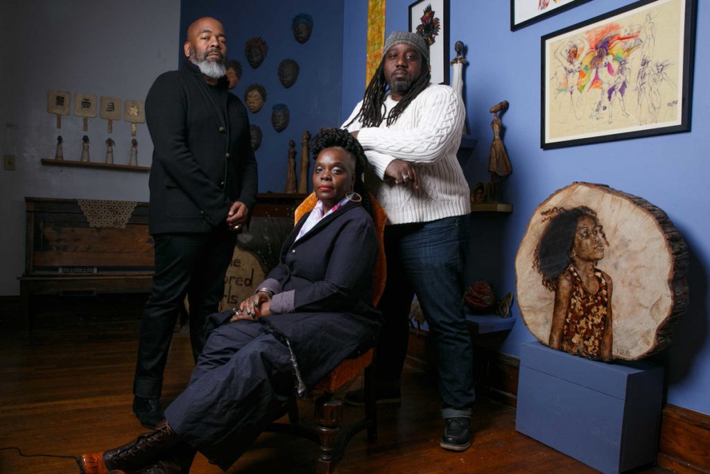 Photo by Jessica Griffin, Partners Michael Clemmons, left, Vashti Dubois, center, and Ian Friday, right, at the Colored Girls Museum, Friday, March 10, 2017, in Philadelphia.