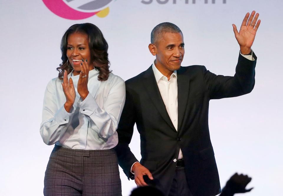  Former President Barack Obama, right, and former first lady Michelle Obama appear at the Obama Foundation Summit in Chicago. The Obamas have unveiled a slate of projects in development for Netflix, a year after the former president and first lady signed a deal with the streaming platform. The Obamas’ production company, Higher Ground Productions, announced Tuesday, April 30, 2019, a total of seven films and series that Barack Obama said will entertain but also “educate, connect and inspire us all.”(AP Photo/Charles Rex Arbogast)
